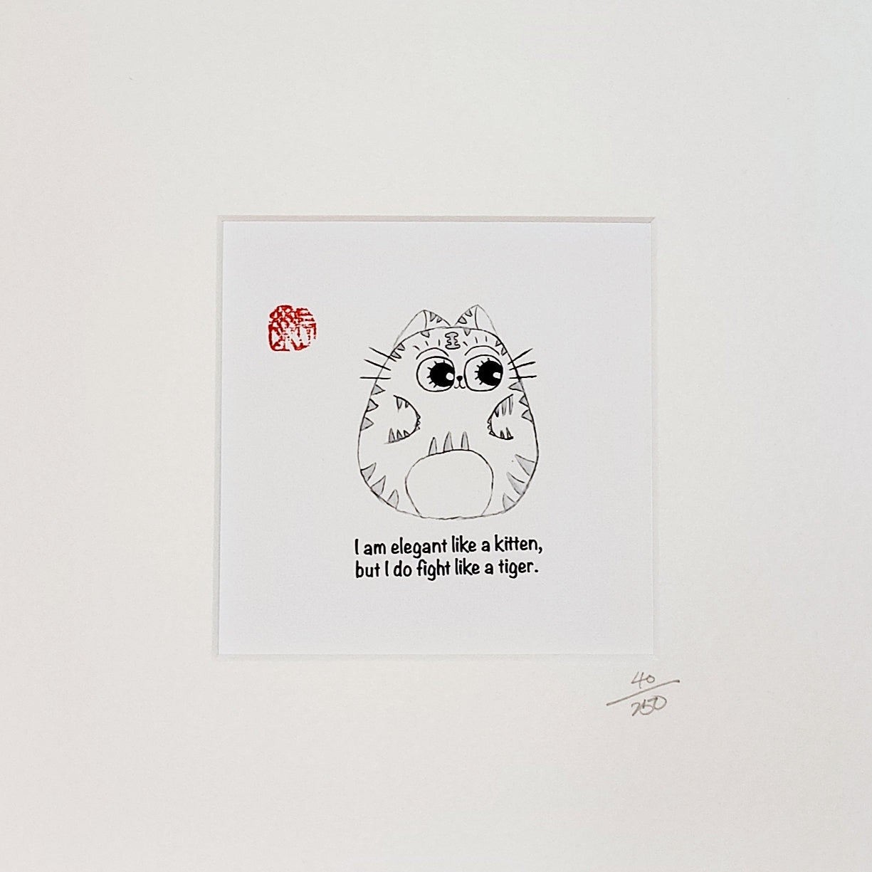 I am elegant like a kitten, but I do fight like a tiger.